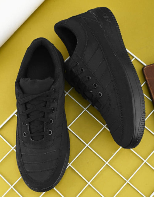 Dropdash stylish black sneakers for men with lace-up design and comfortable sole on yellow grid background