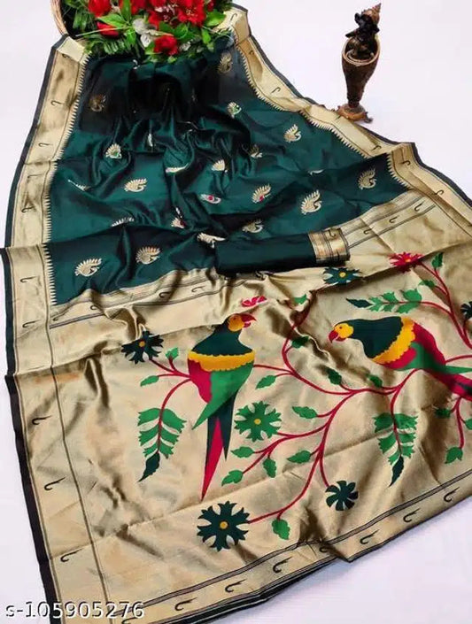 Blue Banarasi saree with blouse featuring intricate parrot and floral embroidery on beige and teal fabric