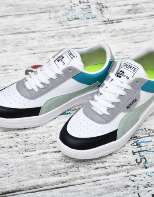 Dropdash casual sneaker shoes for women in white with gray, black, and teal accents on wooden floor