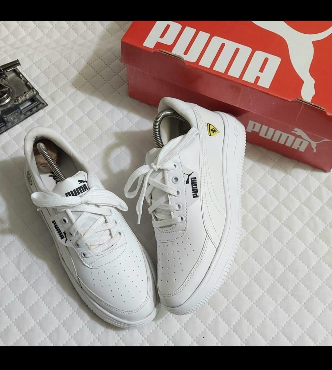 White Puma men's sneakers displayed with red Puma shoe box premium men's casual shoes