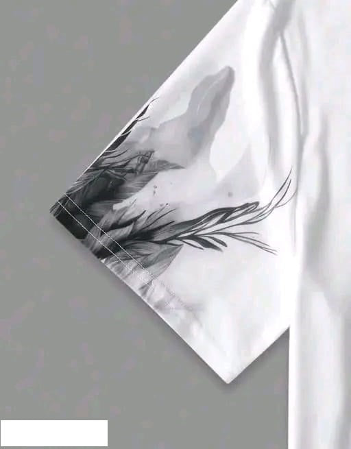 Close-up of sleeve on white men's trendy wolf design t-shirt featuring black and gray wolf and foliage graphic