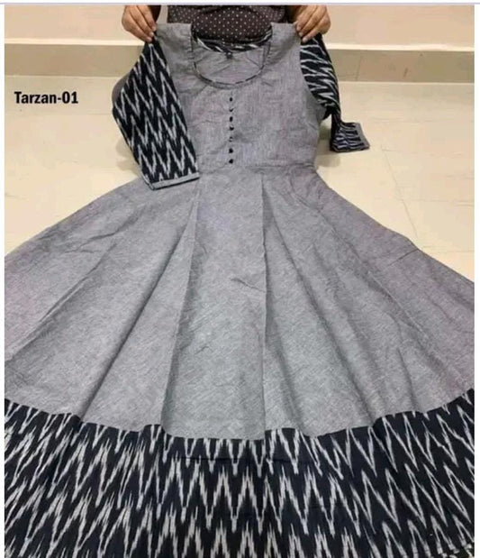 Women's grey cotton gown with black and white patterned sleeves and hemline in flared design