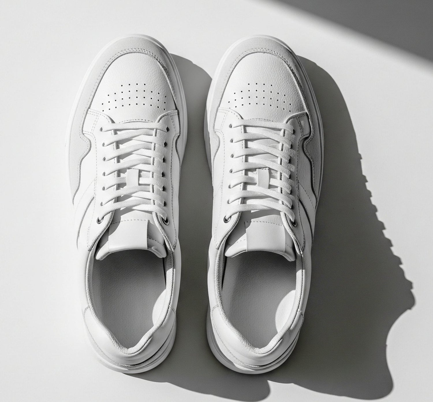 White stylish sneaker splashing water showcasing best shoes for parties and office in trendy collection