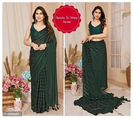 Affordable georgette saree for ladies in dark green color worn by model showcasing front and back views