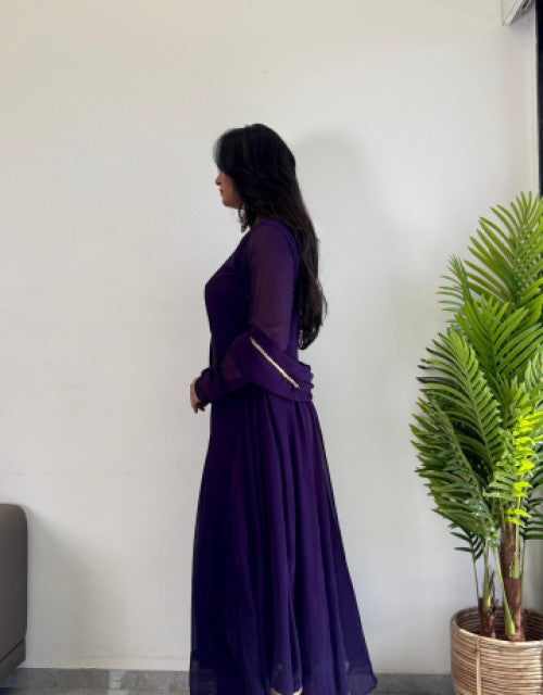  girls clothing affordable party wear kurti India in deep purple with full sleeves and flowy design