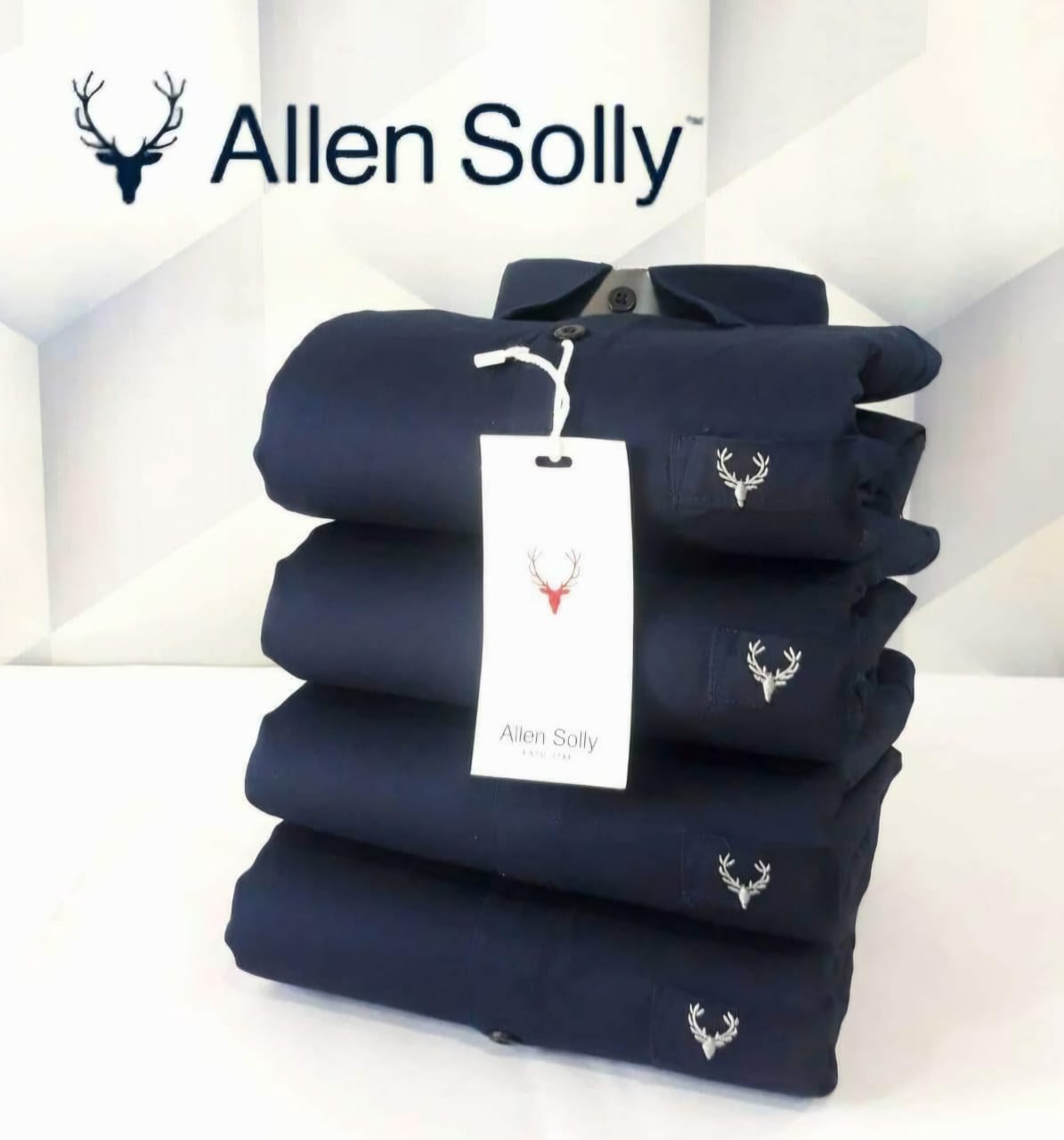 Stack of navy blue mens cotton full sleeves shirts by Allen Solly with logo tag