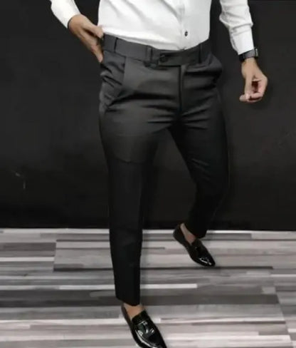 Black lycra formal pants for men paired with white shirt and black loafers by QuickGadgets
