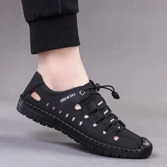 Black men's casual fashion shoes with breathable cutouts and adjustable laces for comfort