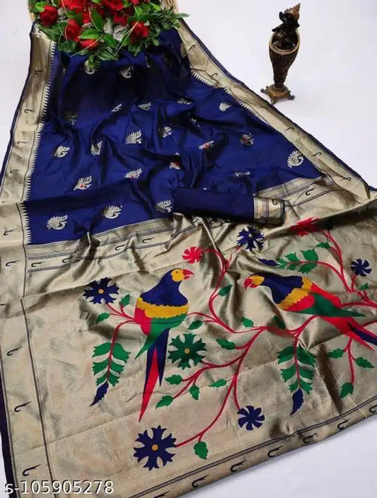 Blue Banarasi saree with blouse featuring intricate bird and floral embroidery on beige border