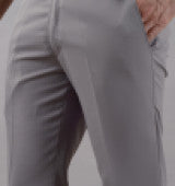 Close-up of light purple men's formal trousers showing fabric texture and fit