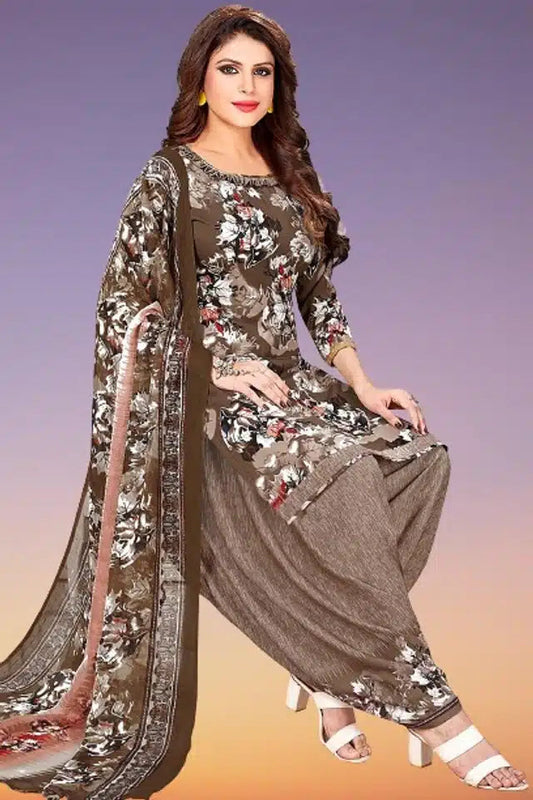 Woman wearing a brown unstitched suit fabric with floral prints and matching dupatta