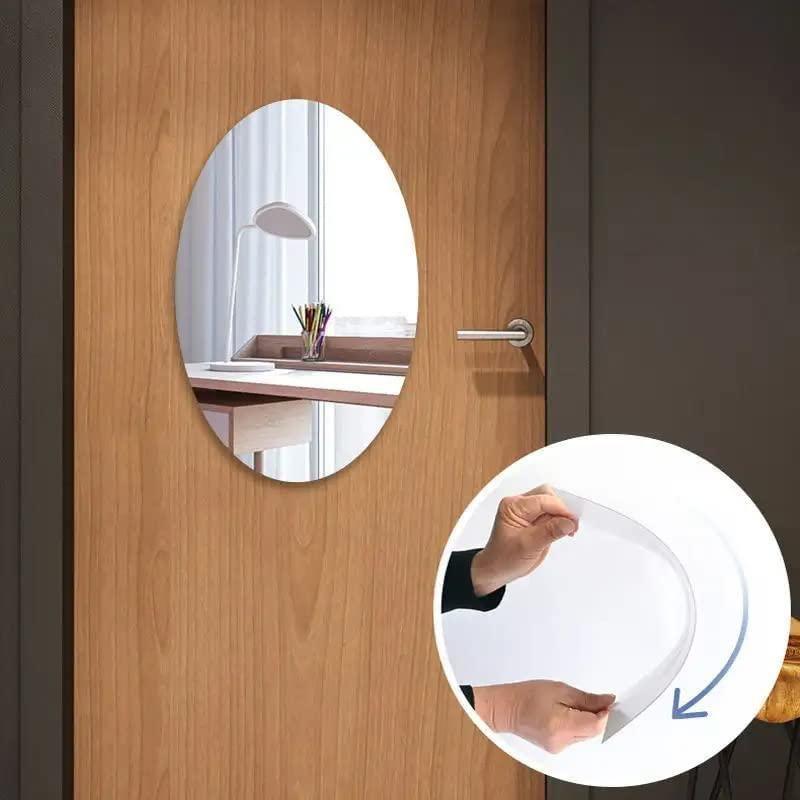 Oval designer makeup mirror mounted on wooden door with protective film remove feature buy designer mirrors online India