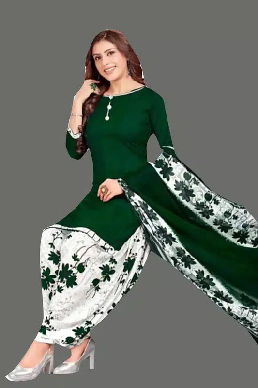 Womens unstitched suits featuring crepe printed dress material with green and white floral design