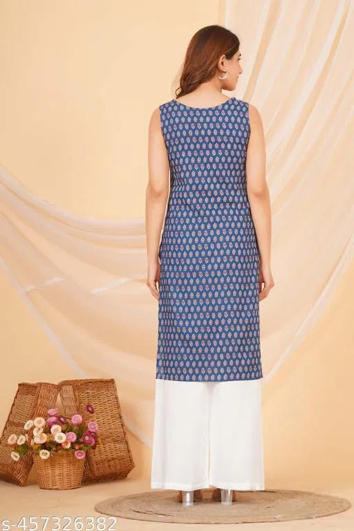 Blue sleeveless women’s kurti with intricate pattern paired with white palazzo pants daily wear kurti online