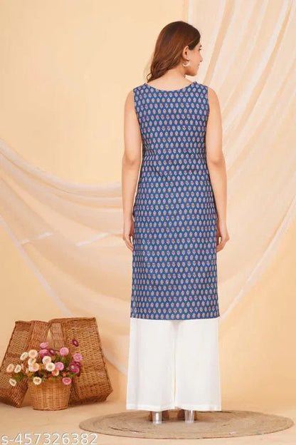 Blue sleeveless women’s kurti with intricate pattern paired with white palazzo pants daily wear kurti online