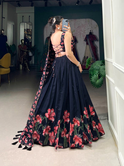 Back view of designer lehenga choli for women with black floral skirt and lace-up blouse