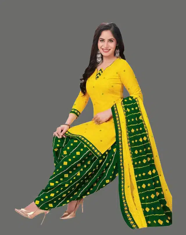 Woman wearing yellow and green designer suit fabric for girls in unstitched womens suits