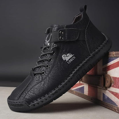 Black leather men's black boots with lace-up design and stitched sole for casual wear