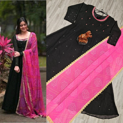 Black womens gown paired with pink dupatta featuring embroidery, perfect long kurti for wedding and parties