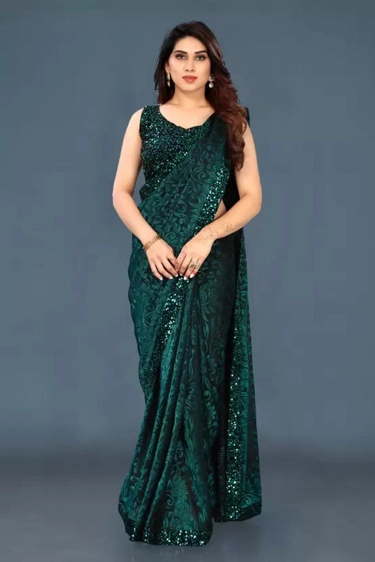 Elegant dark green lycra blend saree for women with sequin detailing and sleeveless blouse