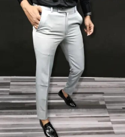 QuickGadgets light gray comfortable men's office wear pants paired with black dress shoes and shirt