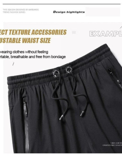Black men's cotton polyester shorts with adjustable waist and zipper pockets for comfort
