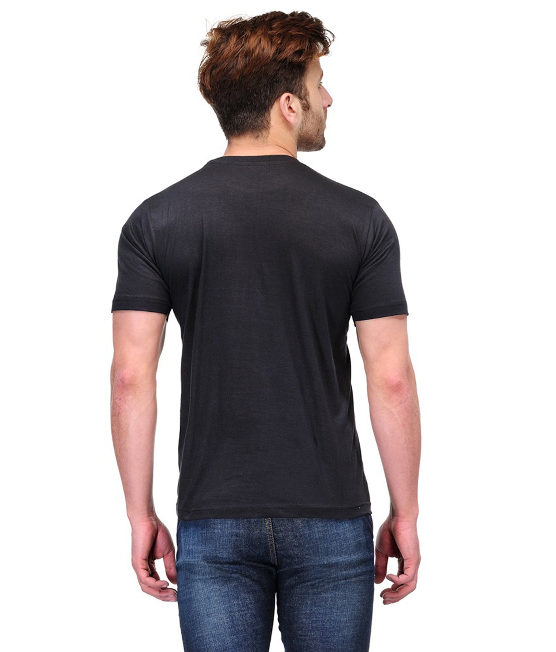 Back view of a man wearing black men's polyester blend dri fit t shirts paired with blue jeans