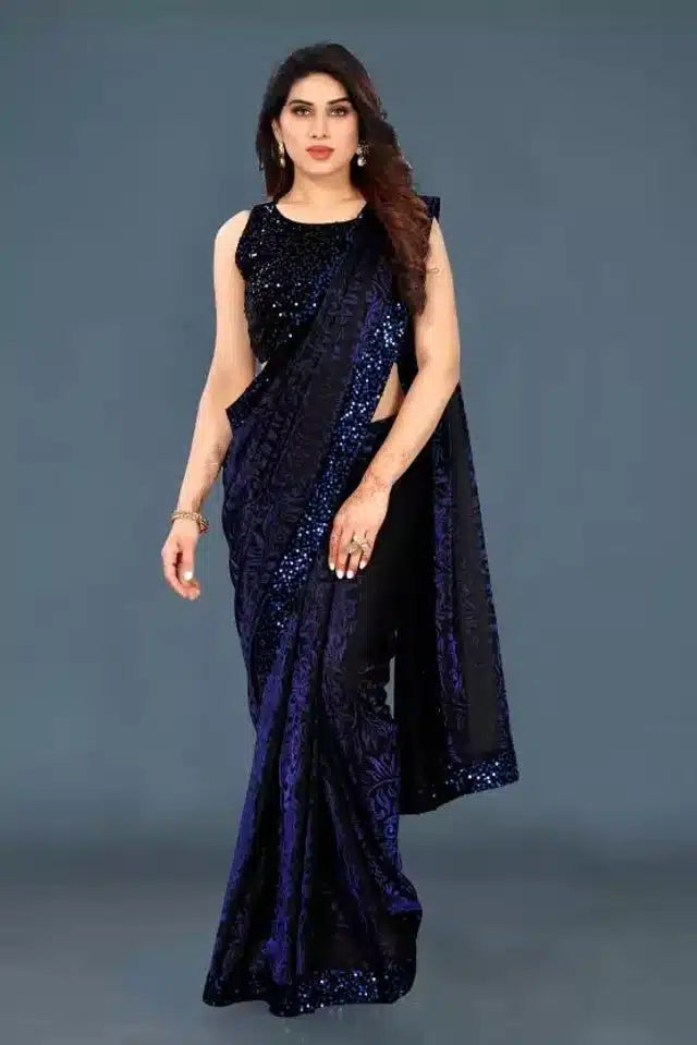 Navy blue sequin saree for women worn by model with matching sleeveless blouse and elegant design
