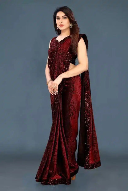 Elegant navy blue sequin saree for women styled with intricate patterns and a matching blouse