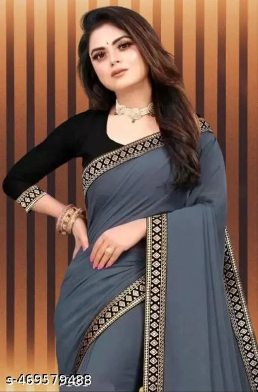 Women wearing premium quality solid saree in grey with black and gold border detailing