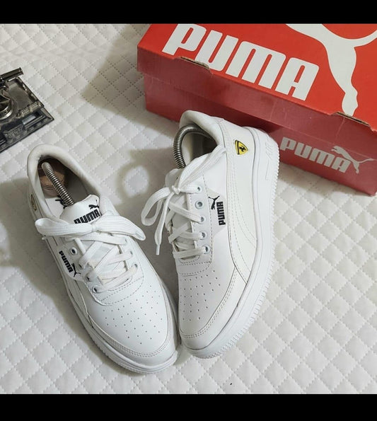 White Puma men's sneakers displayed with red Puma shoe box premium men's casual shoes