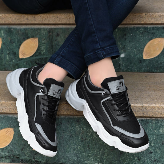 Black and gray comfortable sports shoes for daily wear with white thick soles and lace-up design