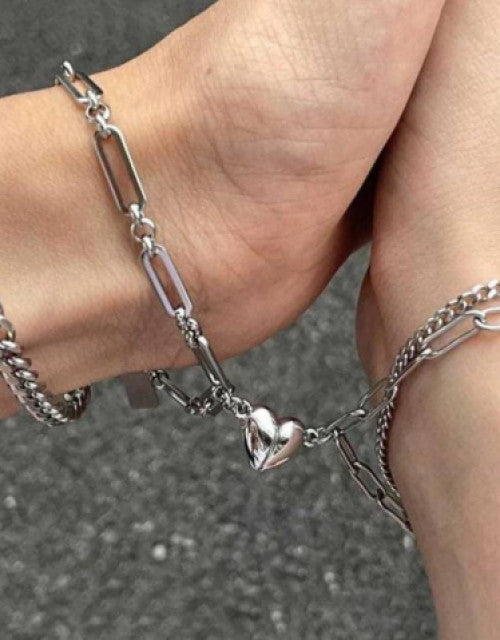 Silver chain bracelet for women with heart charm worn on wrist, perfect Valentine's Week gift from Dropdash