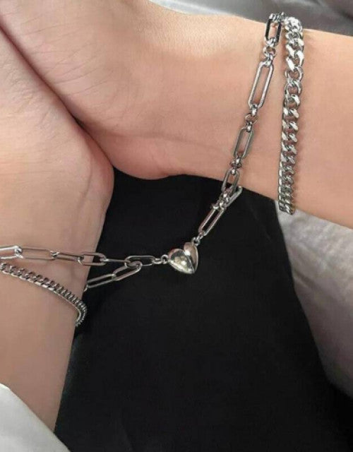 Silver chain bracelet for women with heart charm on wrist, perfect Valentine's Week gift from Dropdash