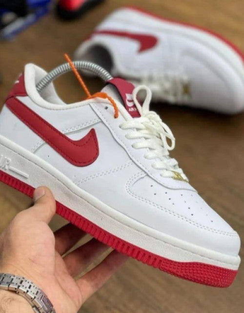 White and red stylish men's casual sneakers with cushioned sole and lace-up design