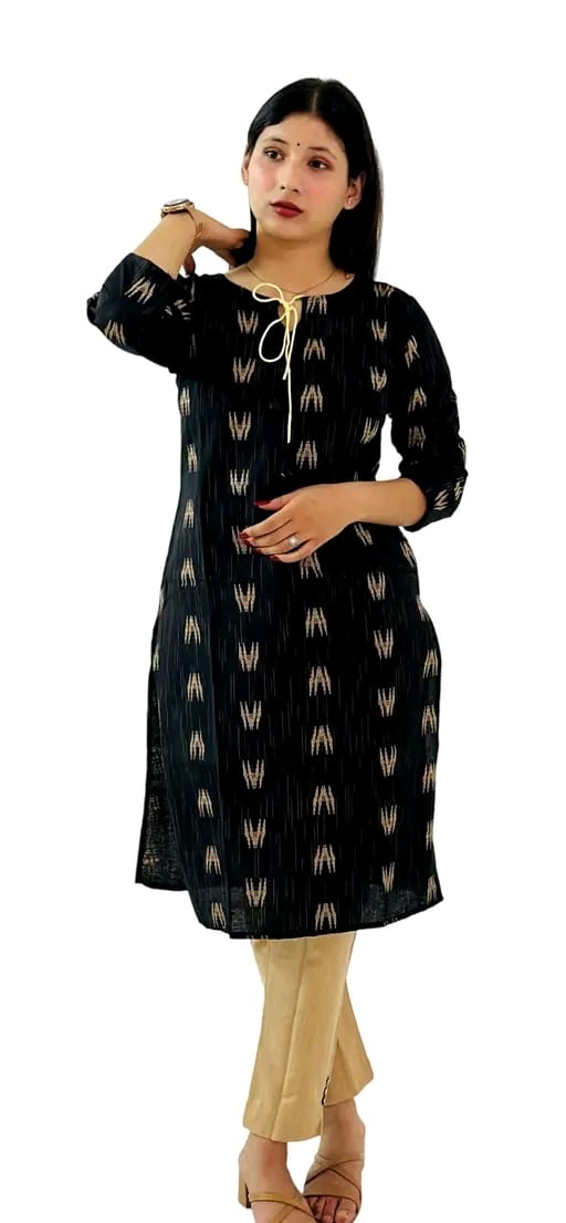 Woman wearing a trendy cotton kurti set in black with beige printed patterns and beige pants