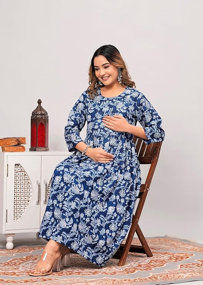 Smiling woman wearing premium quality women kurti India in blue floral print sitting on wooden chair