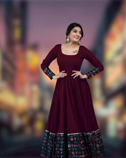 Women's rayon full sleeve gown in maroon with printed cuff and hem detailing by vendor 19199